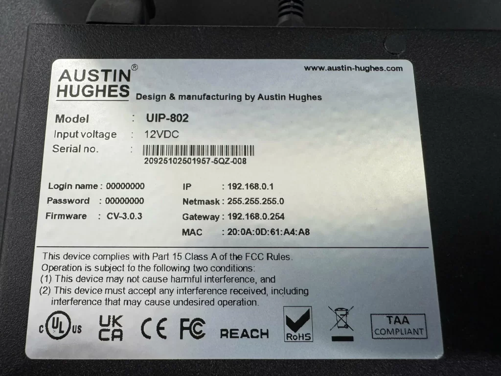 Tem nhãn thông số kỹ thuật KVM switch Austin Hughes UIP-802 hiển thị địa chỉ IP mặc định 192.168.0.1 tài khoản đăng nhập và địa chỉ MAC.